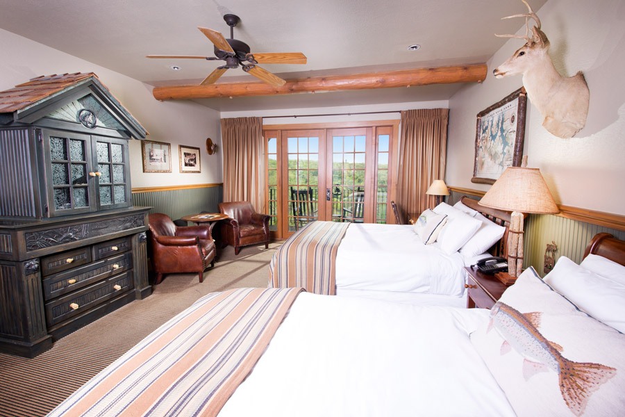 Falls Lodge double queen bedroom accommodation with balcony at Big Cedar