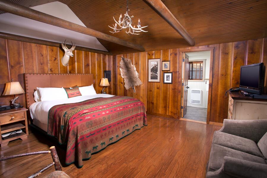 Knotty Pine one-room cottage with fireplace at Big Cedar