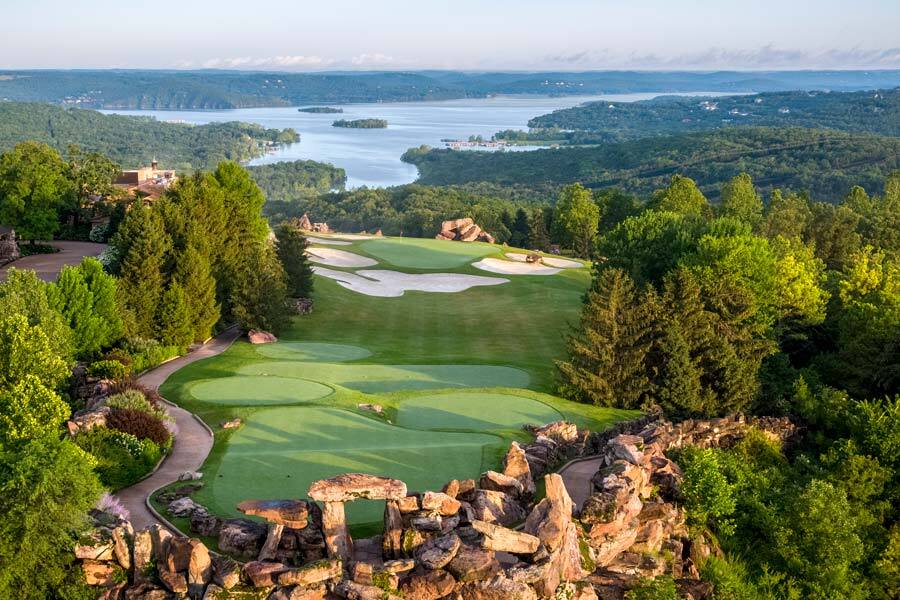 Top of the Rock Hole 9 with Lake in background and rocks in the foreground