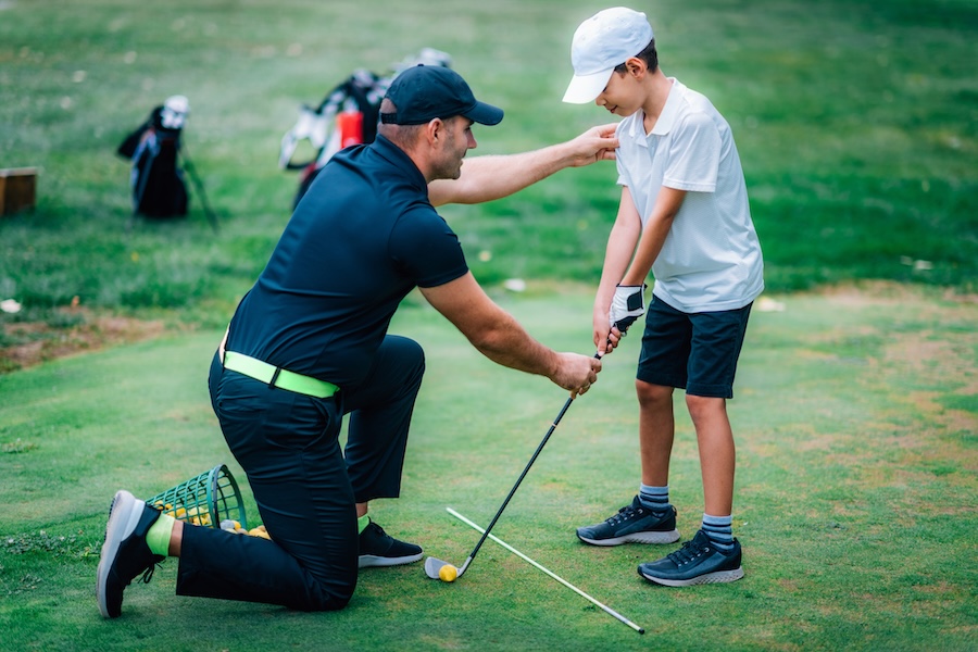 Children's golf teacher