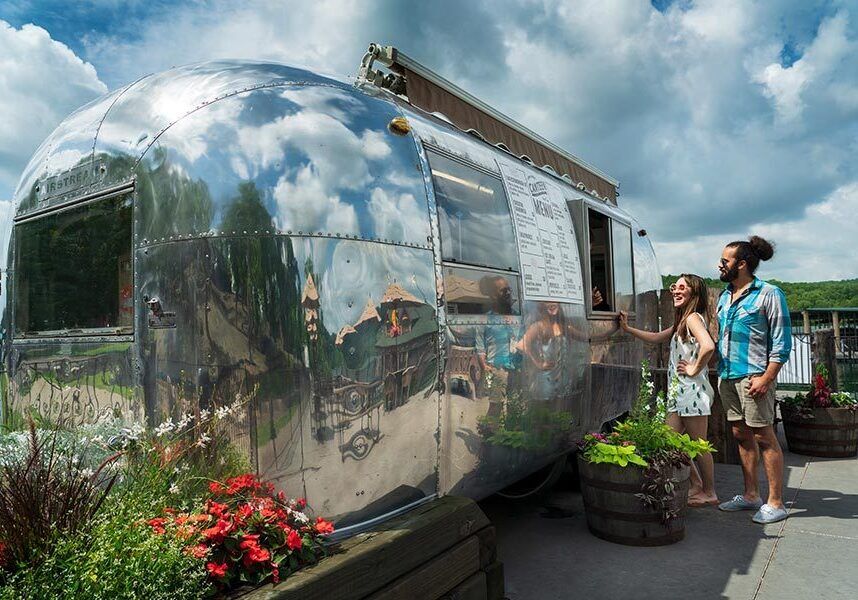 A couple ordering from The Canteen at Camp Long Creek
