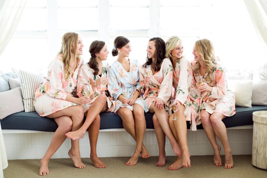 Wedding Bridal party posed in the archway of the bridal suite at the Cedar Creak Spa at Big Cedar Lodge