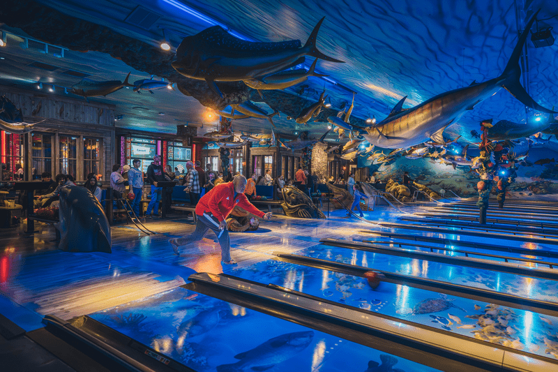 Bowlers at Underwater themed bowling alley