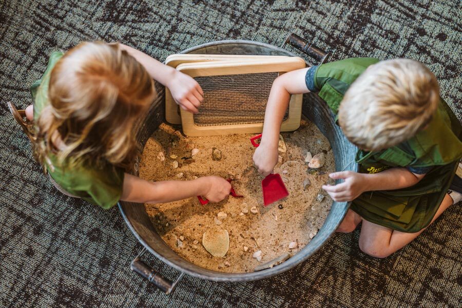 kids playing in sandbox at Kids Adventure club and daycare at Fun Mountain