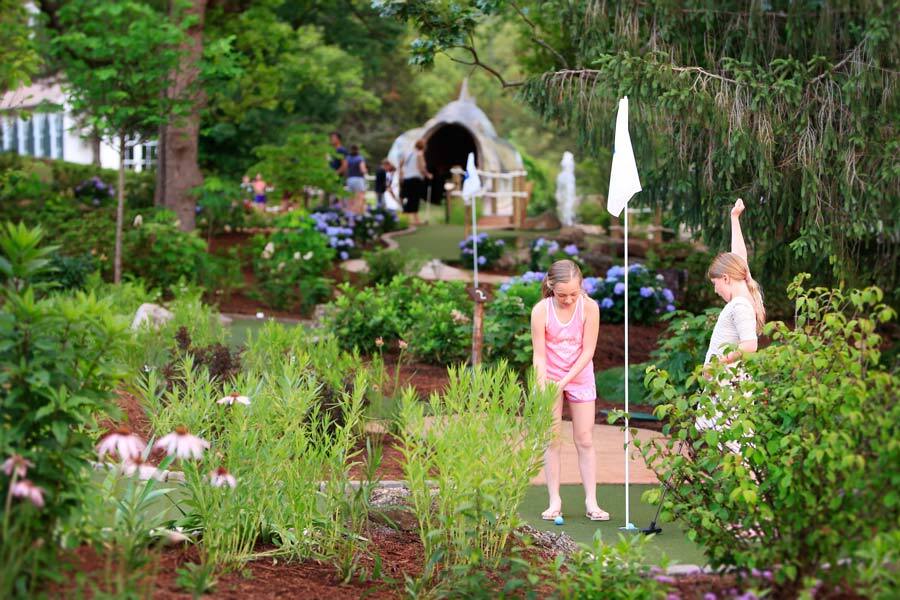 Youth playing mini golf at Big Cedar Lodge