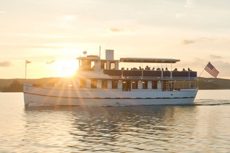 The Lady Liberty sails on Table Rock Lake at sunset.
