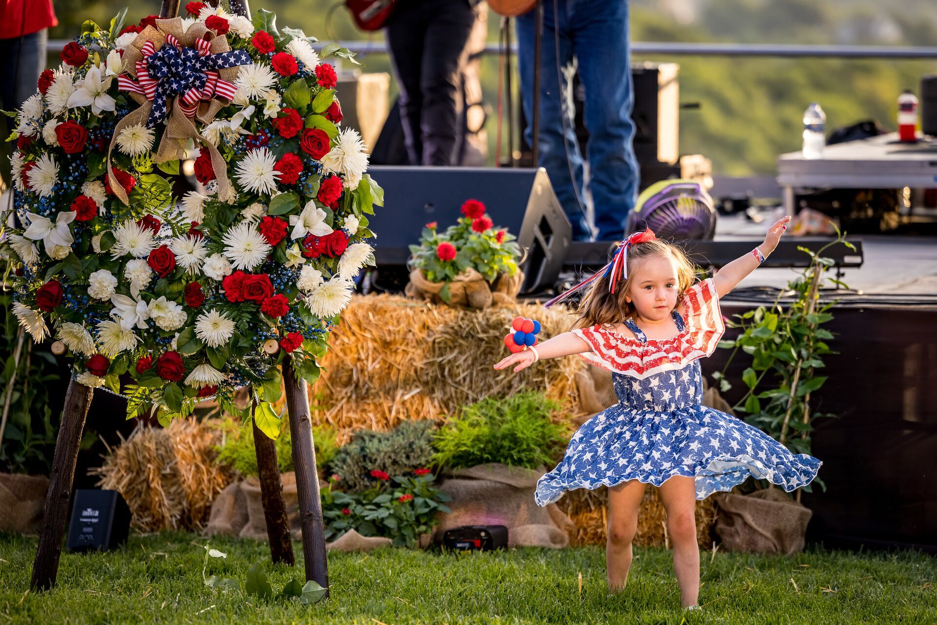 child runs around at memorial day picnic at big cedar lodge