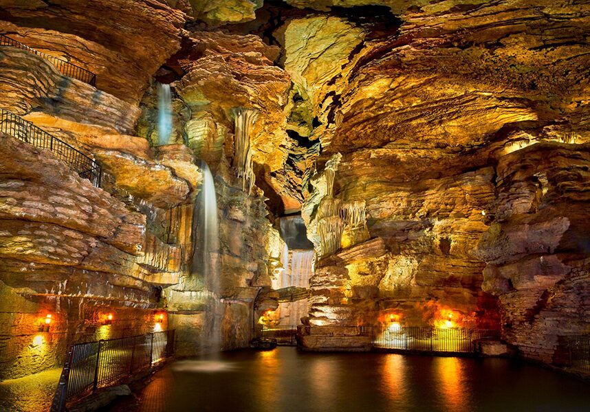 The drive-through cave on the Lost Canyon Cave & Nature Trail where guests drive around the water in the middle.