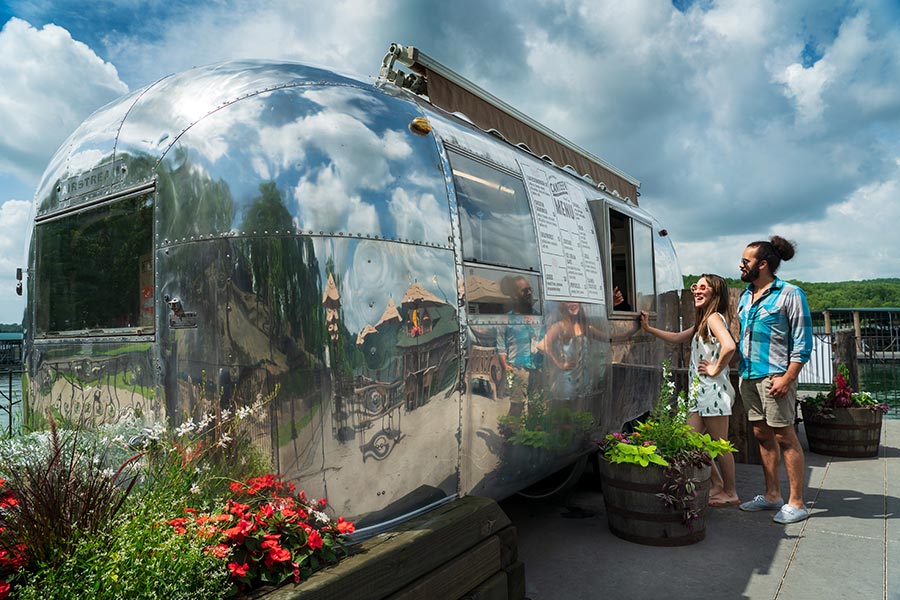 A couple ordering from The Canteen at Camp Long Creek