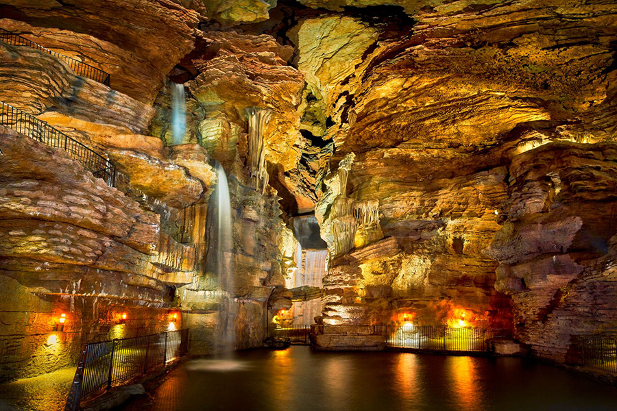 The drive-through cave on the Lost Canyon Cave & Nature Trail where guests drive around the water in the middle.
