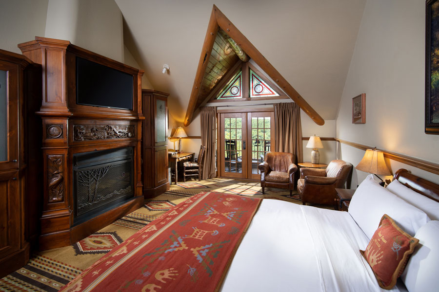 Falls Lodge Premier King bedroom with balcony lake and valley views at Big Cedar