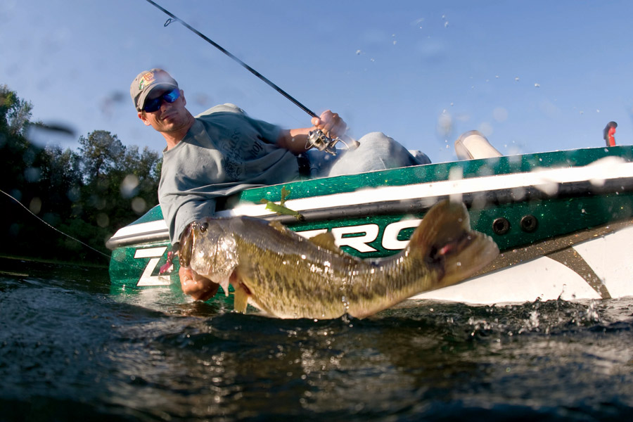 Close up of bass being pulled into the boat on Table Rock Lake at Big Cedar