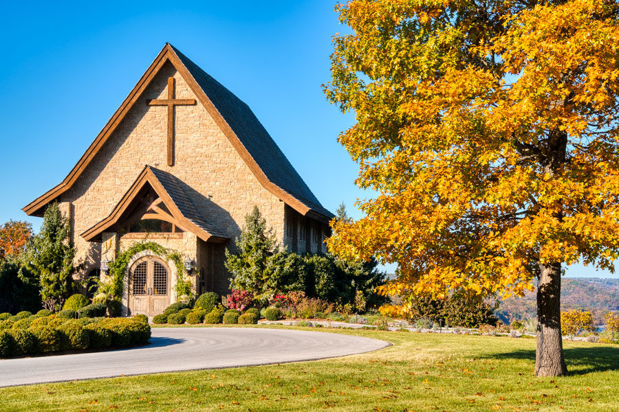 Integrity Hills Chapel in the fall with blue sky above