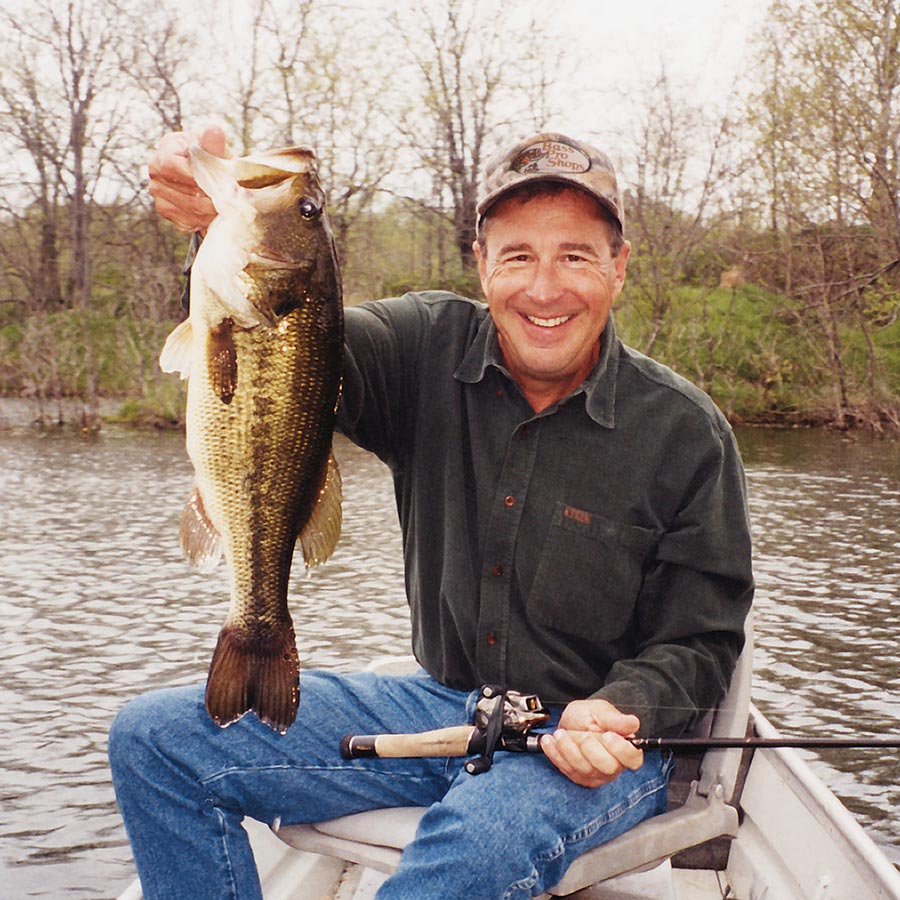 Johnny L. Morris, owner of Bass Pro Shops and Big Cedar Lodge fishing at Table Rock Lake