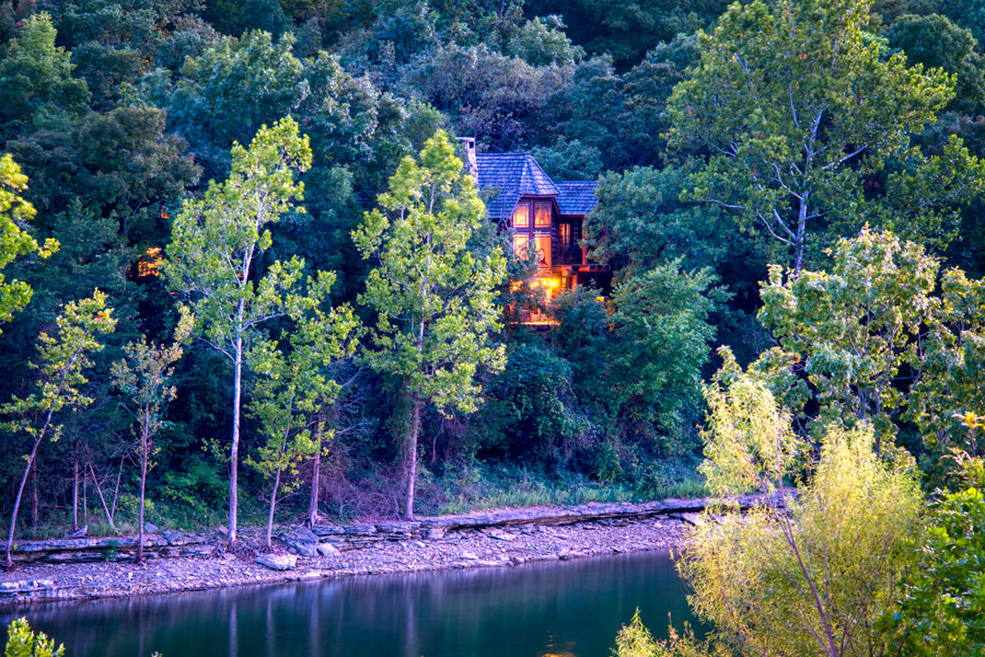 Cabin exterior where the cabin is hidden among the trees at Big Cedar Lodge and Table Rock Lake.