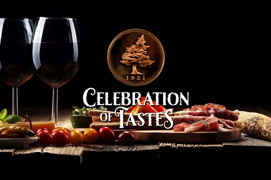 Celebration of Tastes logo over food tray with meat, cheese and wine