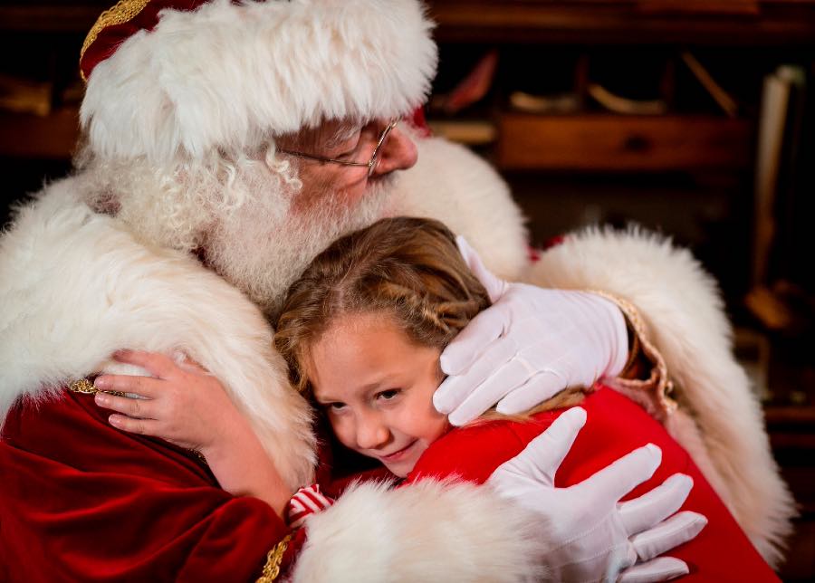 Santa Claus holding child