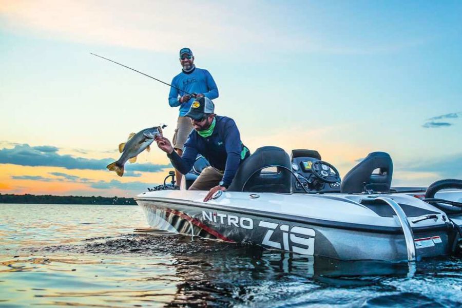 Boat with two fishermen on the lake