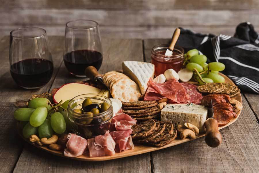 Charcuterie Board with Wine Glasses