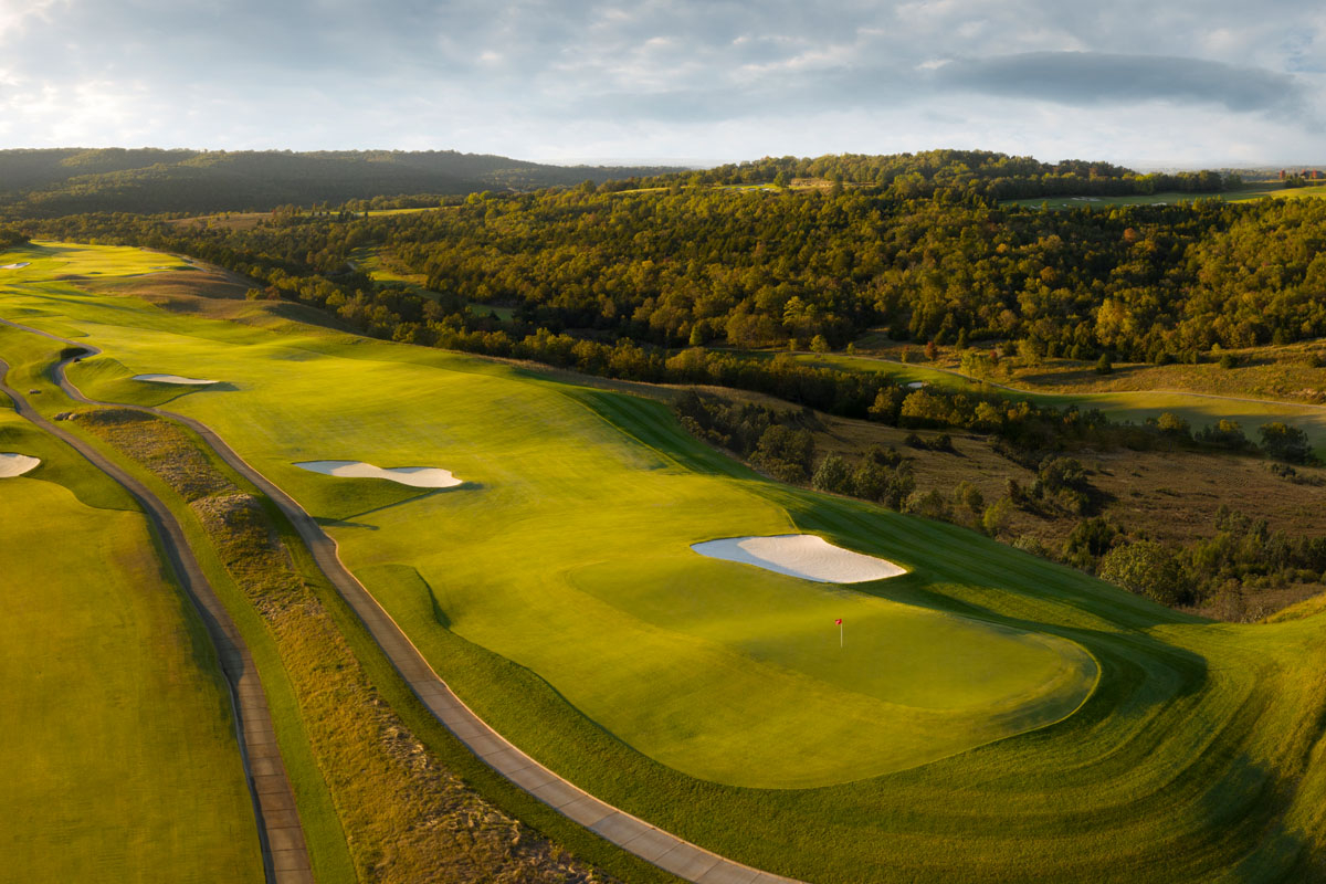 Set among the majestic Ozark Mountains near the Big Cedar Lodge, Payne’s Valley is the first public TGR Design golf course in the United States. Sprawling, wide fairways  showcase playability, while also allowing strategic angles and shot values to be emphasized to challenge experienced players. The green surrounds are designed to promote creativity and a variety of recovery options, while the fairway rough will be maintained to low heights of cut to further promote a fun, enjoyable golf experience.