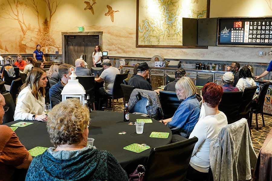 A group of adults playing Beverage & Bingo at Big Cedar Lodge