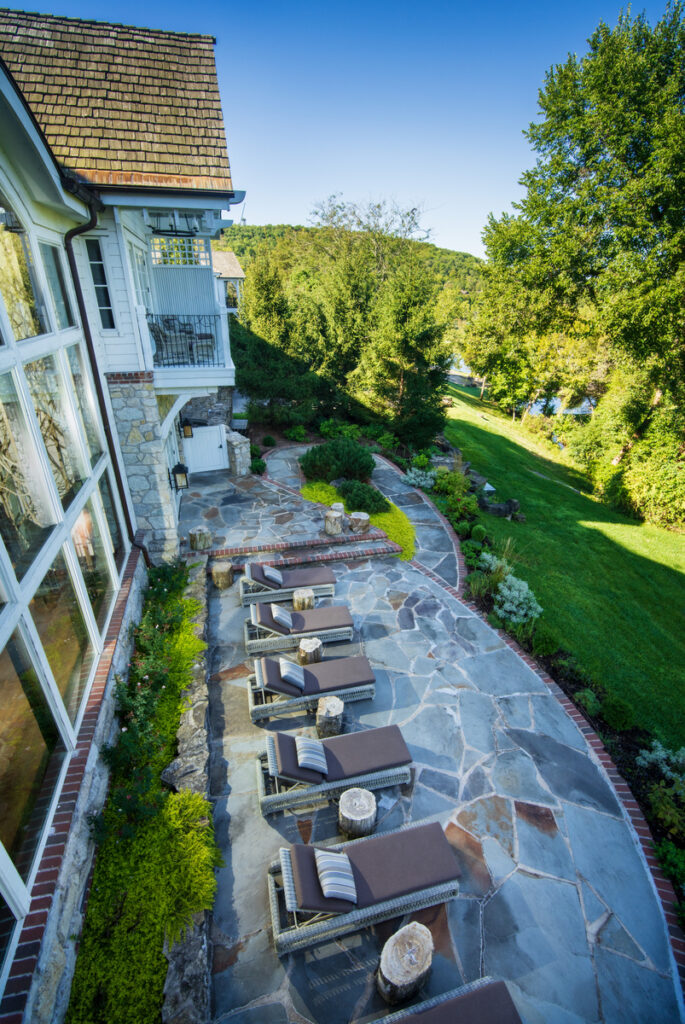 Lounge chairs across the private patio at Cedar Creek Spa.