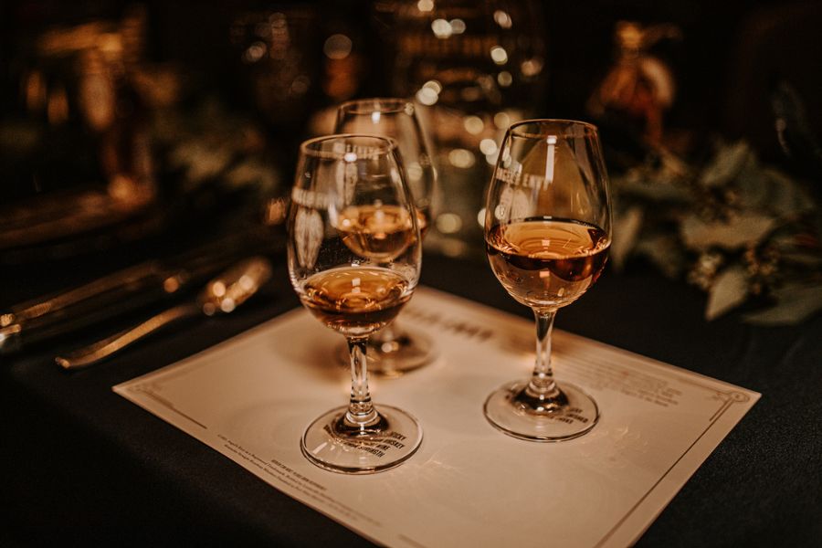 Three glasses of bourbon are arranged for a tasting at Big Cedar Lodge's Master of Bourbon event