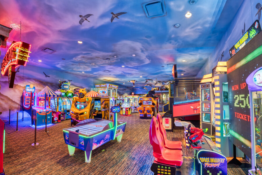 fun mountain arcade with neon lights spread all over