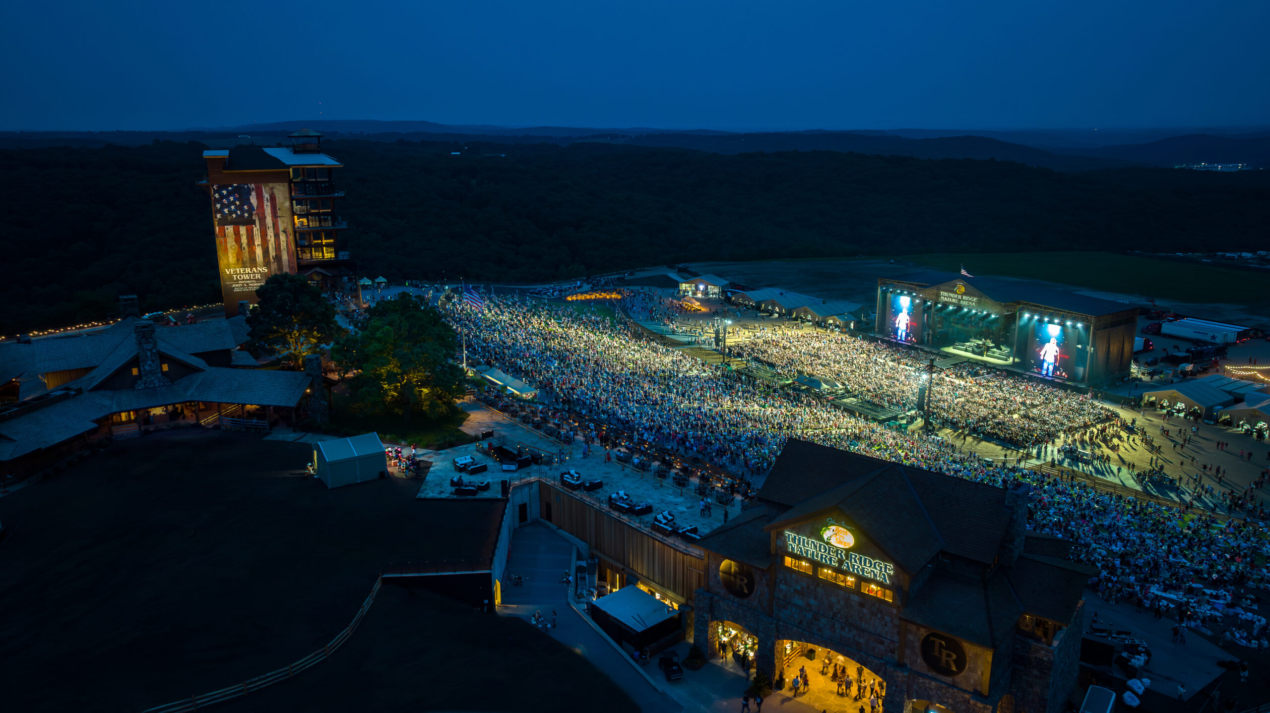 Nighttime image of crowd at a concert at Thunder Ridge Nature Arena