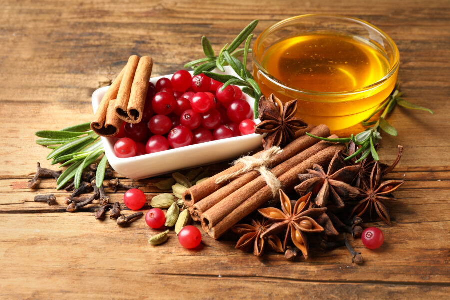 Composition with mulled wine ingredients on wooden table