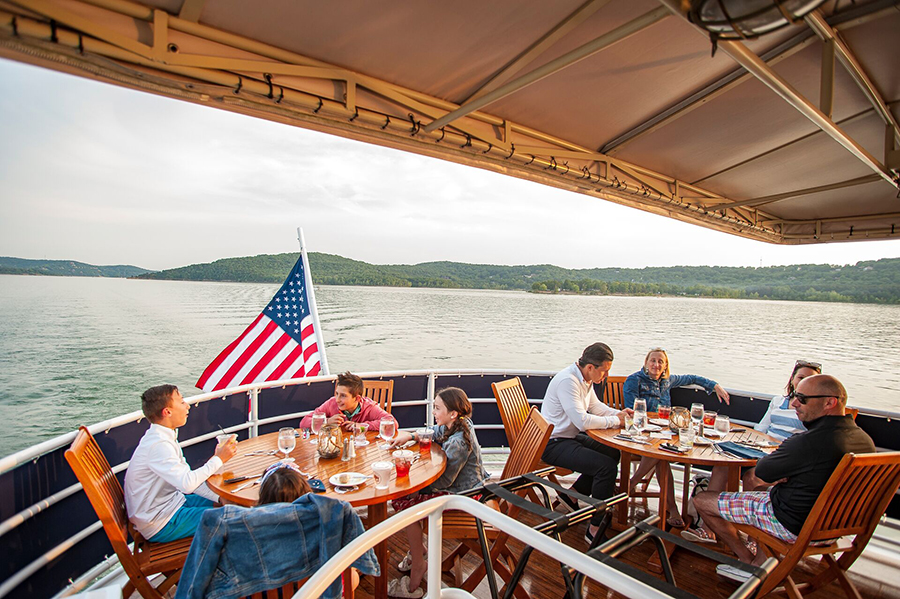 guests enjoy a cruise and meal aboard the lady liberty