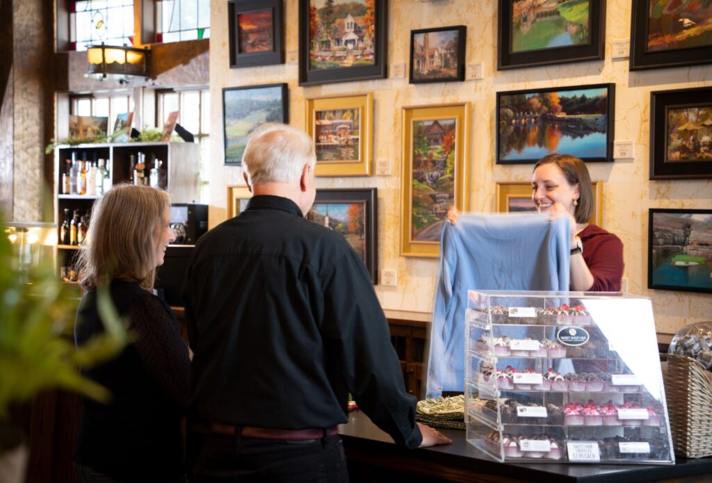 guests checking out at the shoppe
