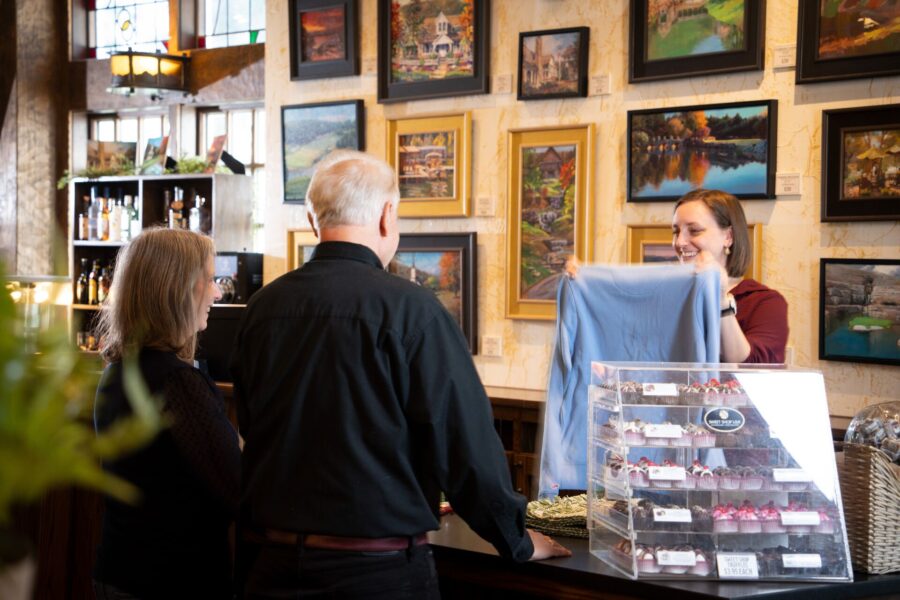 guests checking out at the shoppe