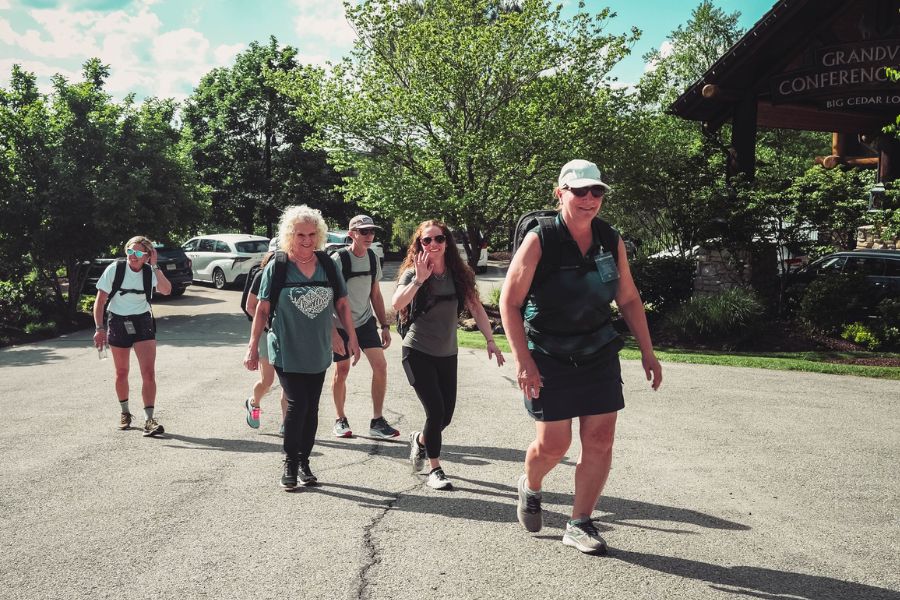 A group of people enjoy rucking at Big Cedar Lodge