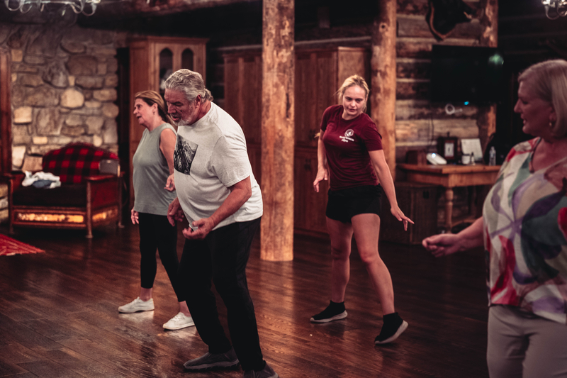 Group learning how to line dance