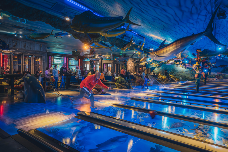 Bowlers at Underwater themed bowling alley