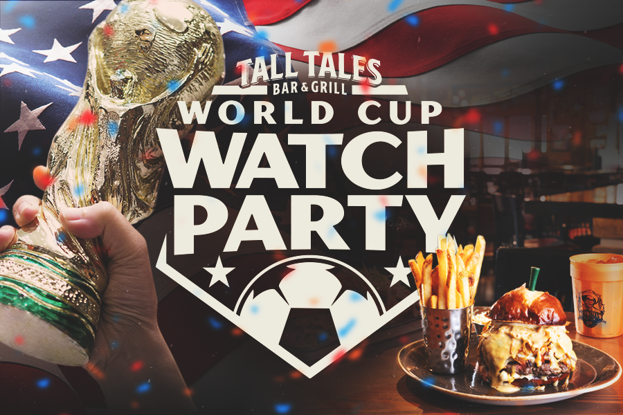 A World Cup trophy held up next to burger and fries