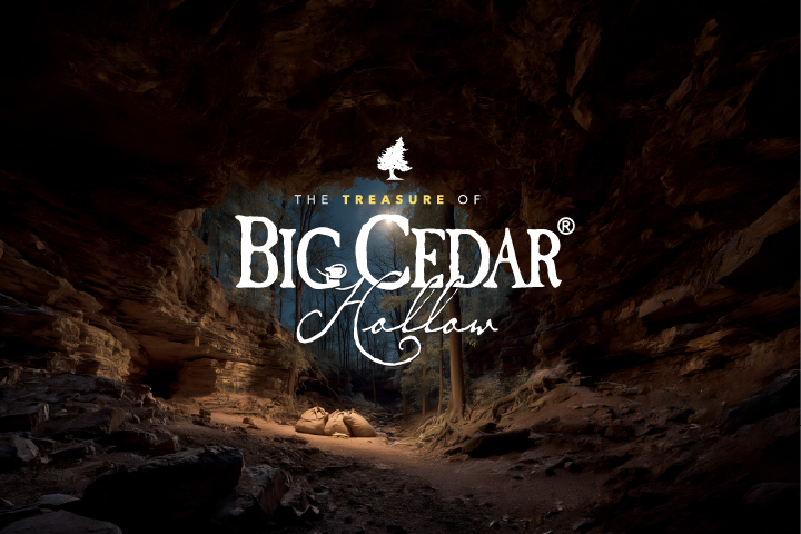 A cave with hidden treasure and the Big Cedar Hollow Treasure Hunt Logo