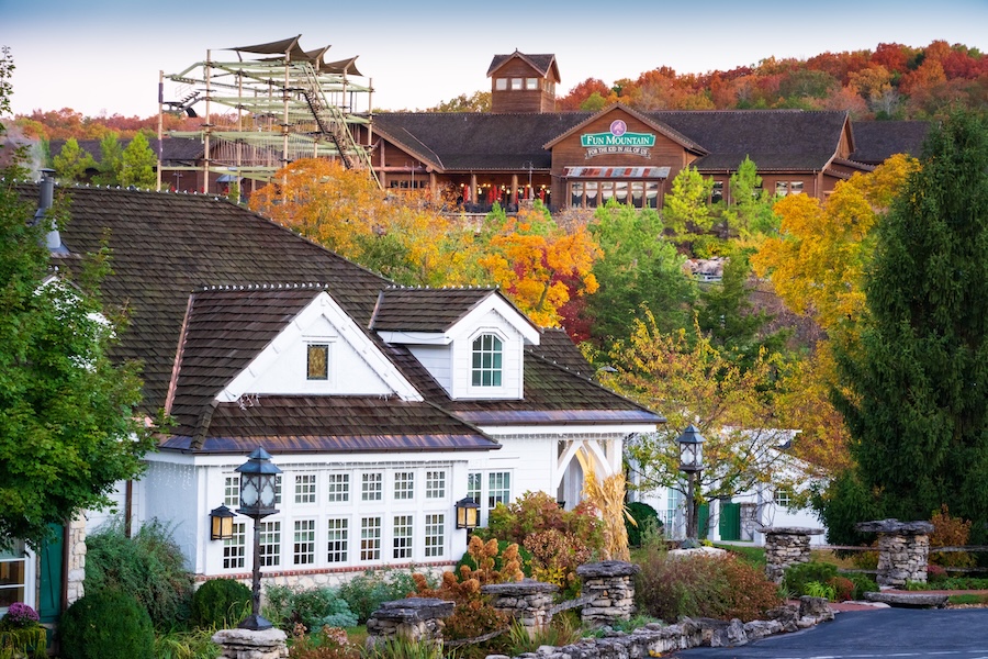 The Big cedar Spa at fall with Fun Mountain on the hillside in the distance behind it