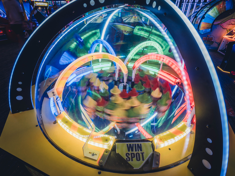 A brightly colored ticket winning game in an arcade.