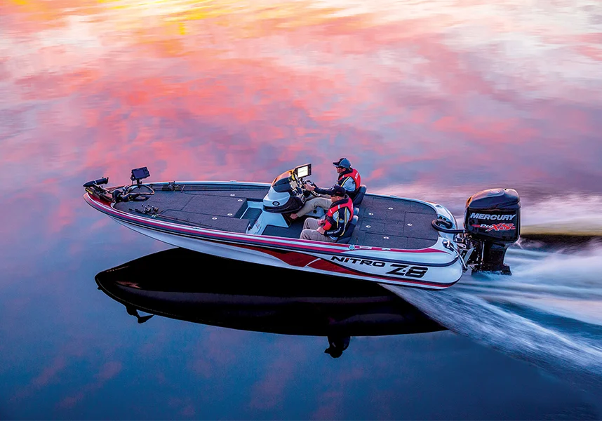 nitro z8 gliding across still water reflecting the sunset on table rock lake