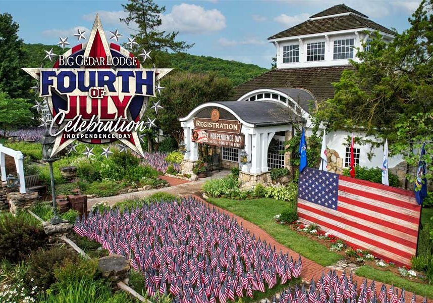 The lawn outside of the Big Cedar Lodge registration building is covered in small United States flags for a July 4th celebration