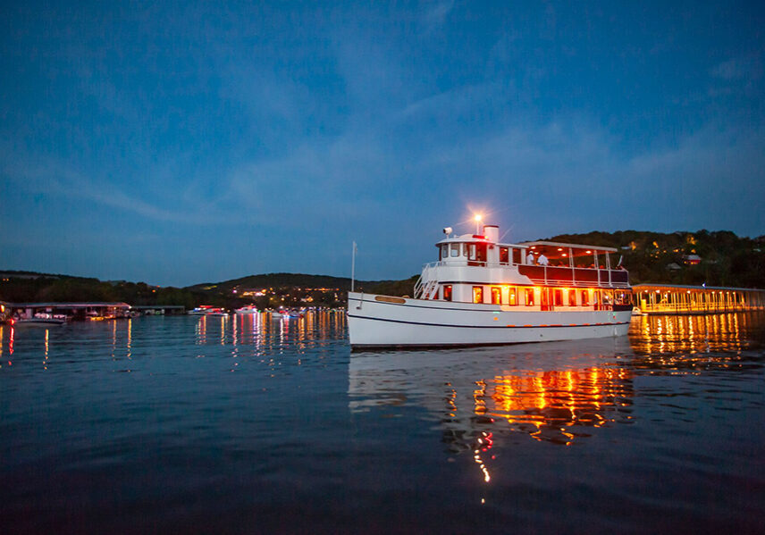 lady liberty sets sail aboard a night time cruise