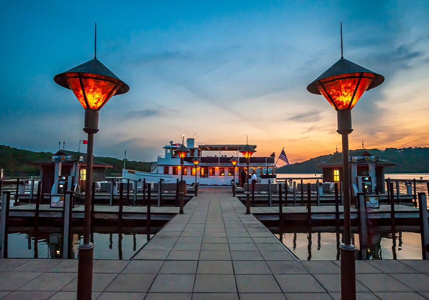 lady liberty docked at long creek marina in the sunset