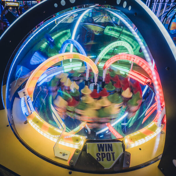 A brightly colored ticket winning game in an arcade.