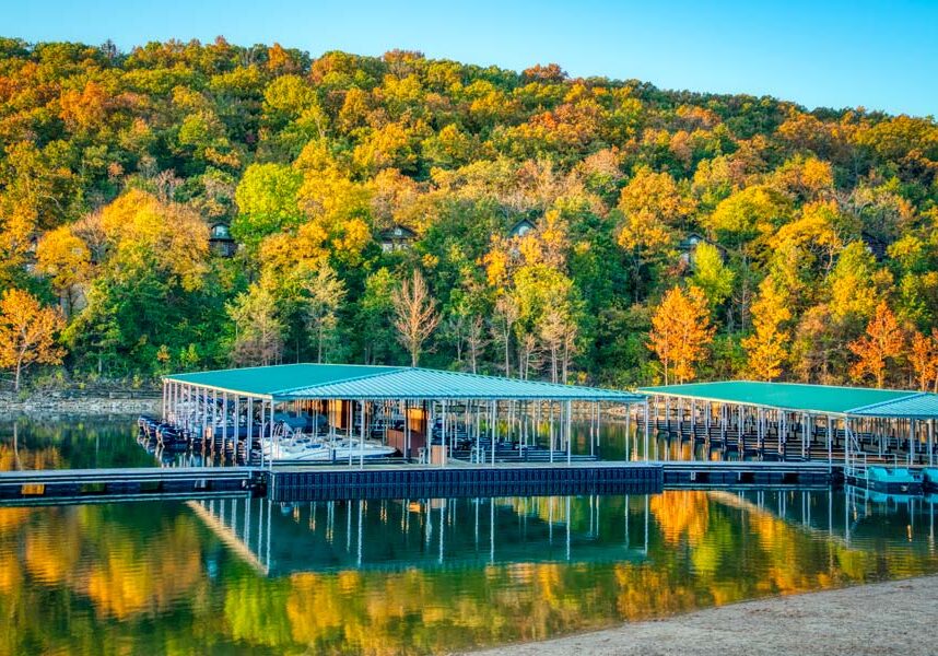 Bent Hook Marina at Big Cedar boat docks against a hillside of fall trees