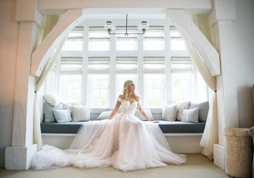 Bride posed in the archway of the bridal suite at the Cedar Creak Spa at Big Cedar Lodge